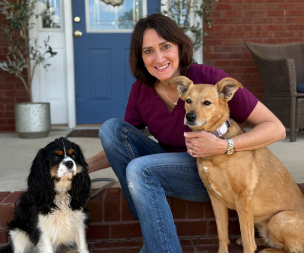 doctor with two dogs